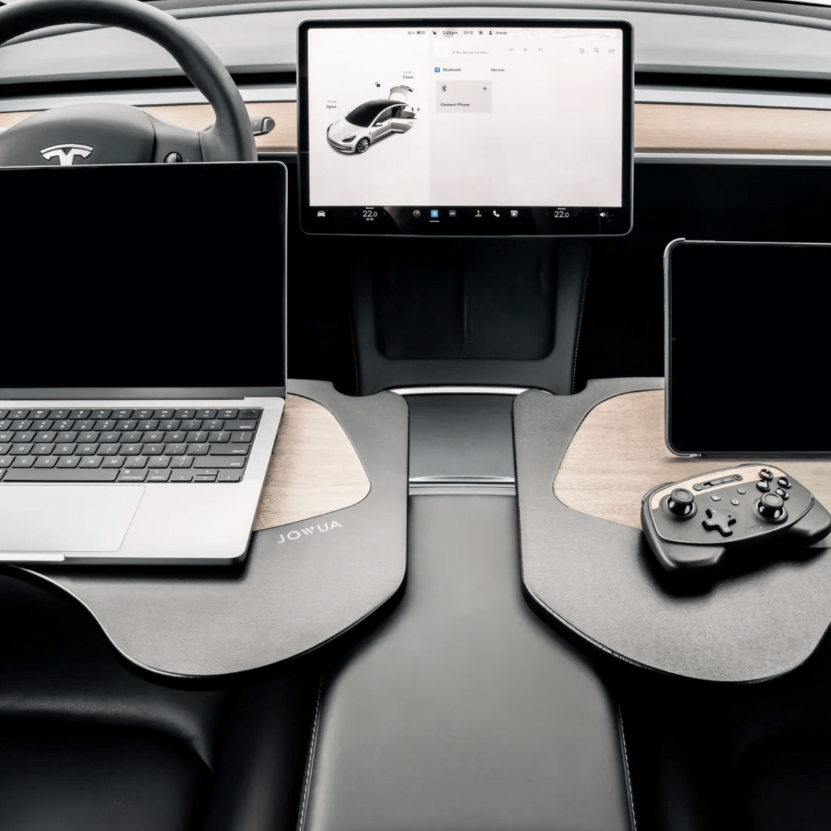 Foldebord i Tesla med kopholder, flot kulfiber-look