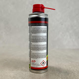 Bagsiden af EXO 9 Universal Oil 250 ml. dåse med brugsanvisning og faresymbol