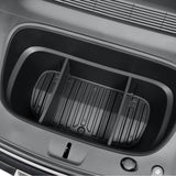 Tom Tesla Model Y Juniper frunk med monteret sort deler set fra oven, viser rummets opdeling