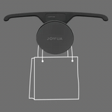 Jowua magnetholder som holder en skitset pose. 