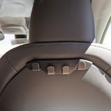 Minimalistisk ryglænskrog i sort design, tilpasset interiøret i Tesla Model 3 og Y
