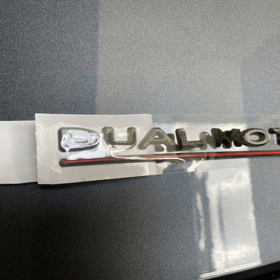 Dual Motor emblem (fl. farger)