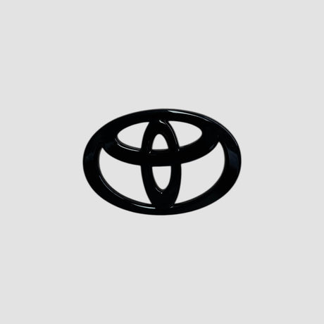 Emblem cover i mat sort til Toyota bZ4X's bagemblem