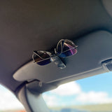 solbrille holder monteret