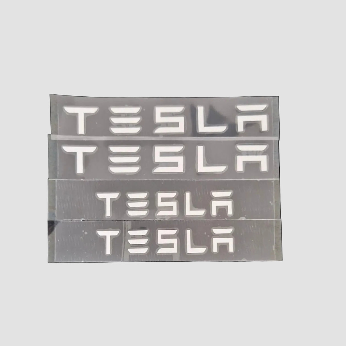 Bokstaver "TESLA"
